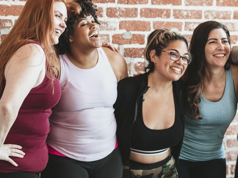 Happy women supporting each other in journey to lose weight